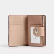 Medium Corner Zip Wallet In Signature Canvas