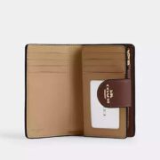 Medium Corner Zip Wallet In Signature Canvas