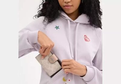 Medium Corner Zip Wallet In Signature Canvas