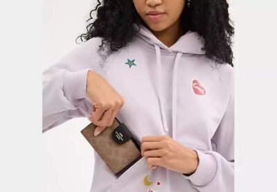 Medium Corner Zip Wallet In Signature Canvas