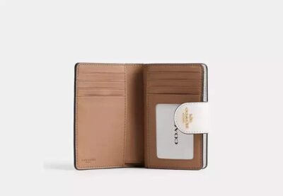 Medium Corner Zip Wallet In Signature Canvas