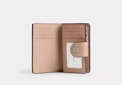 Medium Corner Zip Wallet In Signature Canvas