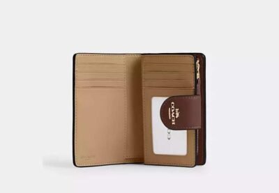 Medium Corner Zip Wallet In Signature Canvas