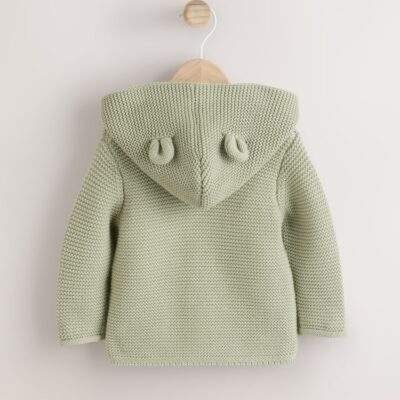 A cozy and cute organic cotton knitted cardigan with a hood and adorable 3D ears.