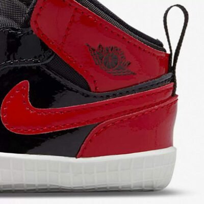 Nike Jordan 1 Crib Bootie Black & Red with a Patent Finish