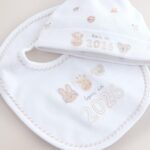 White Baby Sleepsuit and Hat Set